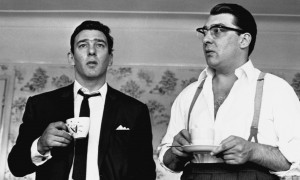 1966, London, England, UK --- The Kray twins at home after having been questioned by police about the murder of George Cornell. --- Image by © Hulton-Deutsch Collection/CORBIS